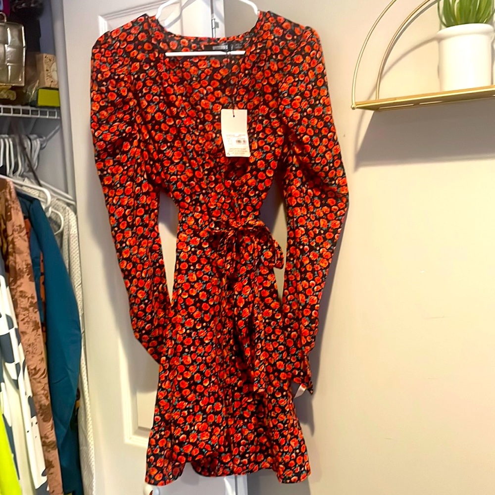 Pretty little Things Red rose dress. Color is red and size is US 10. No stretch